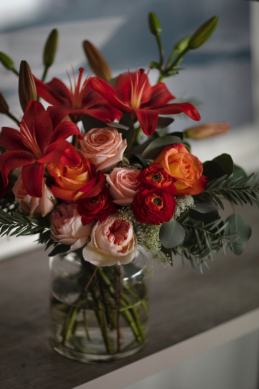 The Florté | Fragrant Lily, Table Vase, Orange Peach Roses, Olive, Bright, Vibrant, Premium Fresh Flowers